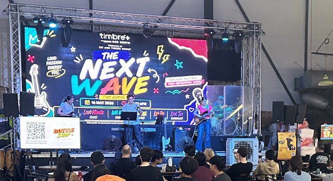 Wide view of a youth band performing at The Next Wave